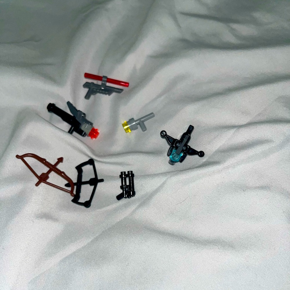 Lego mini figure blaster and bow pieces